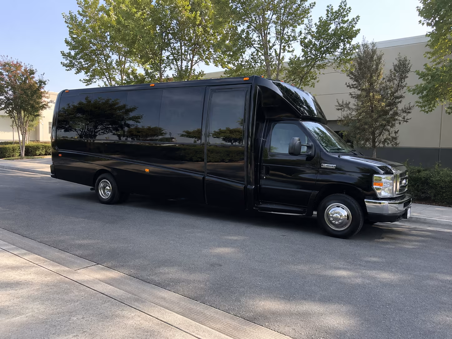 Wedding guests seated inside a party bus serving Buffalo